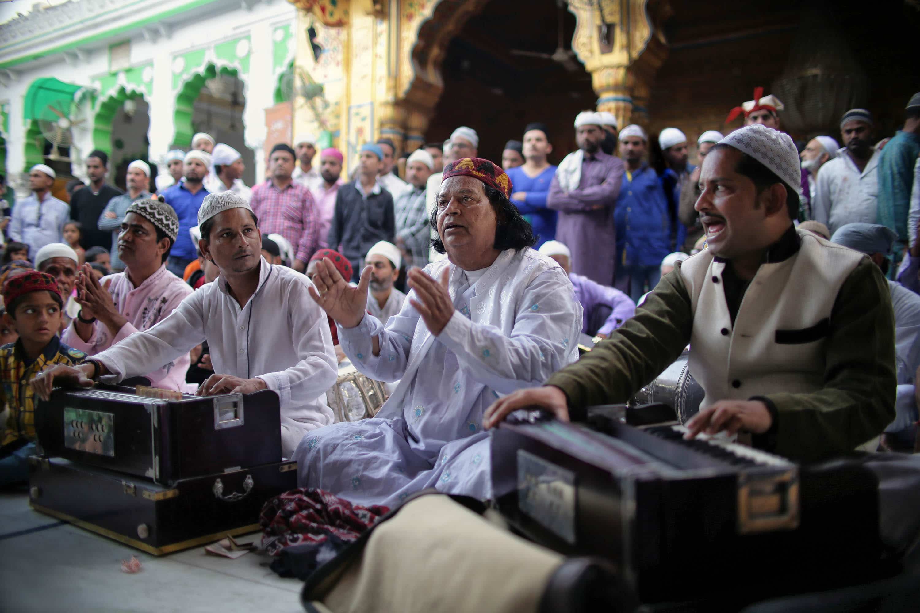 Qawwali singer Farid (right) leads his group after evening prayer in a devotional performance within the famous Ajmer Dargah Sharif a sufi shrine to the sufi saint, Moinuddin Chishti. © Souvid Datta